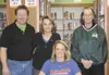 Jamie Krediet, center, signed her National Letter of Intent
recently to attend University of Mary and play for its women’s
soccer team. Photo courtesy of Colony High School