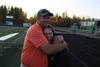 CHS Band Director Jamin Burton (left) hugs Houston band director Samantha Youmans (right). Jacob Mann/Frontiersman