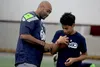 K.J. Wright, who played linebacker for the Seattle Seahawks, worked with local youth during the annual Play 60 event Tuesday at the Menard Center in Wasilla. Jeremiah Bartz/Frontiersman