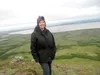 Shelly Blocker stands on Kalskag Hill. She is from the Mat-Su Valley but has taught Head Start in Kalskag and Lower Kalskag for the past two years. Her latest service project will share Chris