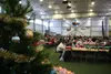 Thousands of Valley residents will gather at the Menard Sports Center for warm meals and warmer company during the annual Christmas Friendship Dinner this Saturday. Frontiersman file photo.