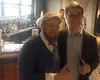 Grassroots ridesharing activist Sam Moore, who has been legally blind since birth, along with Uber Territory Manager David Williams at the 49th State Brewing Company in Anchorage on Tuesday. 