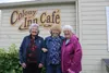 Janet Kincaid, June Oberg, and Joanne Berberich pose for a photo in front of the Colony Inn Cafe in downtown Palmer. Jacob Mann/Frontiersman