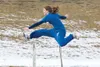 ROBERT DeBERRY/Frontiersman Palmer senior Monica Nuernberg,
above, taps a hurdle with her knee as she practices Thursday at
Palmer High School. Nuernberg is one of 72 athletes on a Palmer
squ
