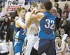 Palmer’s Brian Selmer and Hayden Niekamp double-team Colony’s Hunter Eisenhower during the championship game Saturday at the 2013 Northern Lights Conference Championships in Soldotna. ROBERT 