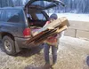 A volunteer helps unload cardboard from waiting cars at the Valley Community for Recycling Solutions location near the Mat-Su Borough landfill in this 2011 Frontiersman file photo. The Boroug
