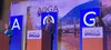 Forum moderator Michelle Egan of the Alyeska Pipeline Service Co., Republican challenger Nick Begich III and Democratic U.S. Rep. Mary Peltola are on the stage at the beginning of the Alaska 