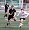Colony's Isaac Villa battles for possession during a tie with Juneau-Douglas midway through the 2025 season. Jeremiah Bartz/Frontiersman