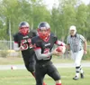 Houston quarterback Jordan Webb, right, runs down the field as
lineman Justin Crowley follows during the Hawks’ 28-20 win over the
Skyview Panthers at Terry Shurtelff Field last week. With a 