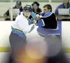 ROBERT DeBERRY/Frontiersman Alaska Avalanche Zach Smith gets
into it with Wenatchee Wild Cameron Severson during the second
period of Saturday’s game at the Curtis C. Menard II Memorial Ice
A