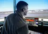 U.S. Air Force Airman 1st Class Ean Holt, a 3rd Operations Support Squadron air traffic controller apprentice, trains in the air traffic control tower at Joint Base Elmendorf-Richardson, Alas