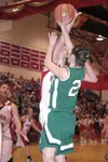 JEREMIAH BARTZ/Frontiersman Wasilla sophomore Kelsey Cottle puts
her hand in front of a Megan Bowker shot during the fourth quarter
of the host Warriors’ 53-34 loss to the rival Knights on Tu