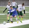 Palmer senior Daniel Adams tries to split the Colony defense and get past Chris Olsen (19) and Ben Atkinson (13) during a 9-0 loss to the Knights April 15 at Colony High School. Jeremiah Bart