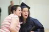 Haily Ibarra poses for a photo with 2011 American Charter
graduate Dezeray Ibarra during last week’s graduation ceremony.
(ROBERT DeBERRY/Frontiersman)