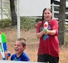 Kids enjoy a safe water gun and water balloon outing during the "Water Fun in the Sun" event hosted by the Houston Fire Department July 4. Katie Stavick/Frontiersman