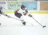 ROBERT deBERRY/Frontiersman Houston sophomore Micah Ranum moves
the puck down the ice during Thursday’s game against the Delta
Huskies at the Curtis C. Menard II Memorial Ice Arena.