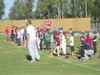 Photo courtesy of the Mat-Su Miners Mat-Su pitcher Kirk Jewasko
helps lead a group of young players through a drill during the
Miners Summer Clinic Monday at Hermon Brothers Field in Palmer.
