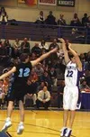 Palmer's Zach Pettit puts up a shot in the third period of
Saturday's championship game against Chugiak. Chugiak beat Palmer
60-59 despite a great effort by Pettit and the Moose. TIM
BRODT/Fr