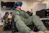 Col. Matthew Crowell, Air Force Safety Center chief of aviation safety, and Capt. Phillip Butler, 314th Fighter Squadron, operate their virtual aircraft at Air Force Research Laboratory’s Dir