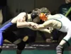 Soldotna's Brayde Wolf locks up with Colony's Sam Sisco during the 126-pound final of the Colony Invitational Saturday night at Colony High School. Sisco won the match 11-0. Jeremiah Bartz/Fr