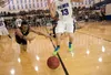 Colony's Antonio Bush dives for the ball as palmer's Nathan Mayer lets it go out of bounds during the final minute of Friday's game against the Palmer Moose at Plamer High School. The Knights