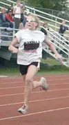 Wasilla's Natalya Miller sprints to the finish line during the
girls' 400-meter relay at the middle school varsity championships
at Palmer High last week. Photo by JEREMIAH BARTZ/
Frontiersma
