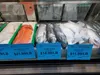Wild Alaska salmon and halibut from different parts of Alaska are displayed on June 28, 2023, at Sagaya City Market in downtown Anchorage. U.S. consumers have a preference for wild fish and A