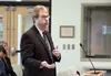 Mat-Su Borough manager John Moosey addresses the Mat-Su Borough Assembly on Tuesday, April 12, 2016, during a presentation on the borough budget at the borough building in Palmer. While some 