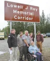 State Rep. Bill Stolze, left, and members of the Ray family mark the official naming a stretch of Blue Lupine Drive the Lowell J. Ray Memorial Corridor. Courtesy photo