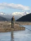 Tony Russ of Wasilla fishes a dip net in hopes of some tasty Copper River salmon. Andy Couch/For the Frontiersman
