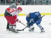Wasilla forward Colton Fletcher faces off against Palmer’s Luke Wright during a 4-0 Wasilla win Thursday at the Brett Memorial Ice Arena in Wasilla. ROBERT DeBERRY/Frontiersman.com