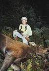 Lexi Pitcher, 10, with the cow moose she shot recently while out hunting with her father in the Big Lake area. Courtesy Photo