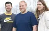 ROBERT DeBERRY/Frontiersman Trim to Win first-place winner Brian
Lampton, center, second-place winner Chris Stratton, left, and
third-place Victoria Loughran lost a combined 121.6 pounds.