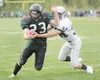 ROBERT DeBERRY/Frontiersman Colony senior running back Ben
McGraw breaks a tackle during the first half of a 24-17 win over
Soldotna. Despite the win, the Knights dropped from first to third
