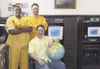GREG JOHNSON/Frontiersman Goslin Price, left, recently earned
his GED while serving time on a drug trafficking charge at Palmer
Correctional Center. Fellow inmates John Yoakum, center, and Je