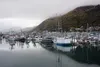 Low clouds hang over Kodiak's St. Paul Harbor on Oct. 3, 2022. Economic woes in Alaska's seafood industry have affected numerous fishing-dependent communities like Kodiak. Yereth Rosen/Alaska