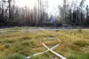 Fire hose extends across a spot in the evacuation area of the McKinley Fire. Tim Rockey/Frontiersman