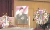 A portrait of Sgt. 1st Class Christopher Robert Brevard is
surrounded by flowers at a memorial service in his honor Thursday
afternoon at Fort Richardson in Anchorage. Brevard was remembered
