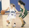 ROBERT DeBERRY/Frontiersman Palmer'€™s Tress Whitfield keeps the
ball away from Service defender Joy Sumabat during the final
seconds of Thursday'€™s game at Palmer High School.