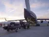 Alaska Air National Guard Airmen of 176th Wing load a Guardian Angel Air-Deployable Rescue Vehicle and an inflatable raft onto a 144th Airlift Squadron C-17 Globemaster III Sept. 12, 2018 at 