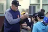 Houston Astros pitching coach Brent Strom works with a group of local players during the Alaska Legion Baseball’s Professional Baseball Clinic Friday, Nov. 11, 2017, at the Menard Memorial Sp