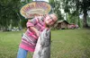 Wasilla's Emma Myers, 8, struggles to hold her 25 lb. plus pound king samlmon she caught Friday on the Deska River near the Deshka River Lodge. The Deshka was open to bait fishing Saturday mo