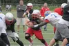 Wasilla head coach Kent Rilatos watches as his varsity offense runs a play during a scrimmage against the Bartlett Golden Bears Aug. 8 at Wasilla High School. Wasilla opens its 2014 season Au