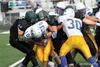 Colony's Alex Hargis (68) and Zach Doan (32) tackle Kodiak's Jay-Ar Small during a 37-0 win over the Bears Sept. 6 at Colony High School. The Knights have not allowed a touchdown in more than