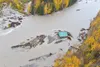 A cabin that washed into the water during flooding in the Willow area is seen from the air. Courtesy photo