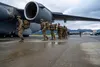 In this image released by the U.S. Air Force, U.S. Army Soldiers assigned to 1st Battalion, 501st Parachute Infantry Regiment, 2nd Infantry Brigade Combat Team (Airborne), 11th Airborne Divis