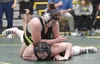 Redington's Nikayla Miller wrestles to a victory over Homer's Araya Andres in the championship match at 185 at the Kachemak Conference wrestling tournament at Seward High School in Seward, Al