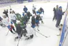 ROBERT DeBERRY/Frontiersman Palmer Moose coach Brad Hanson goes
over hocky drills Friday afternoon during practice at the Palmer
Ice Rink.