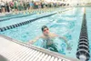 ROBERT DeBERRY/Frontiersman Wasilla senior Jeff Frey shows his
disappointment at not breaking the state record for the boys'€™
50-yard freestyle event Saturday at the ASAA/First National Bank