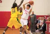 Wasilla freshman guard Dane Kuiper looks for an open Warrior as
he gets double-teamed by Carver (Ala.) Wolverine Nevell Young and
Jose Duncan during Wednesday’s final game at the Doc Larson’s